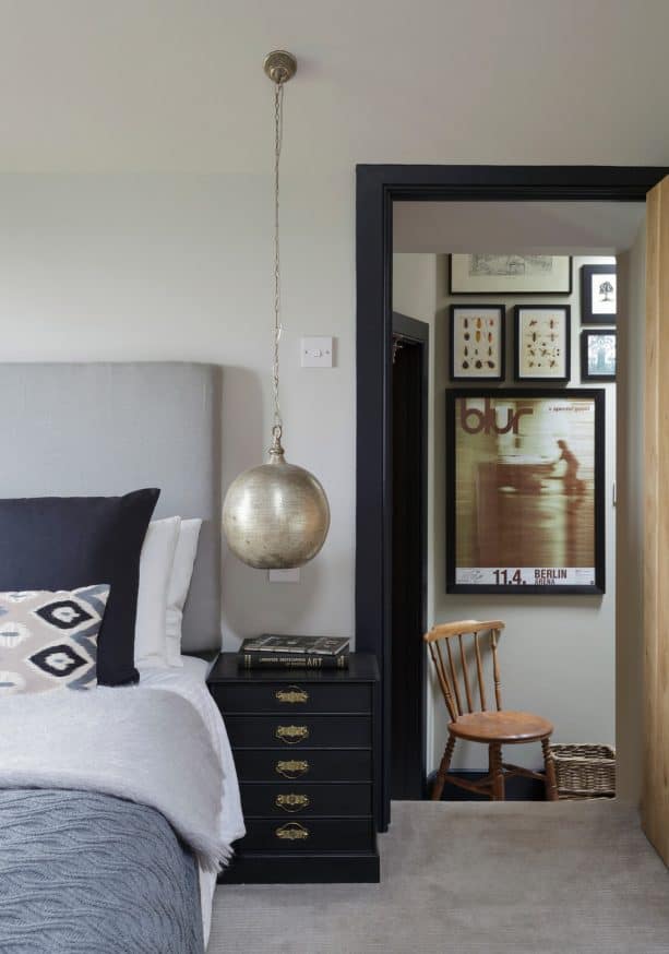 blue and grey bedroom with black trim