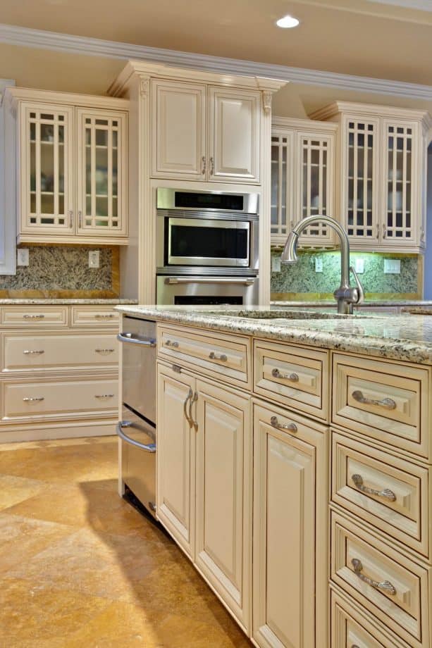 traditional kitchen with antique white maple cabinets with glaze