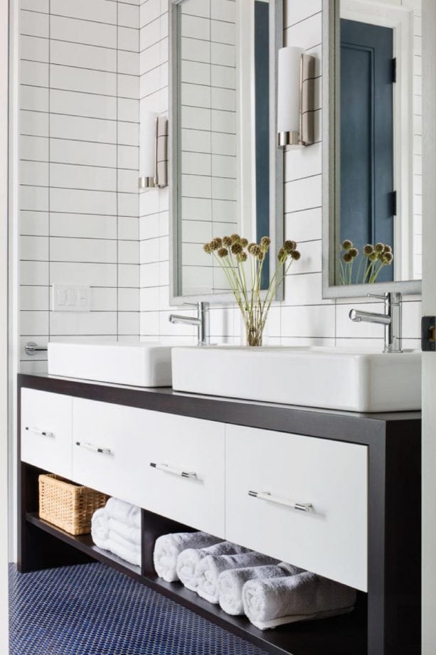 perfect vertical white subway tile wall with charcoal gray grout