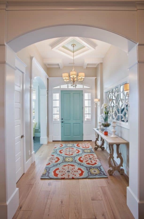 white hallway with blue door
