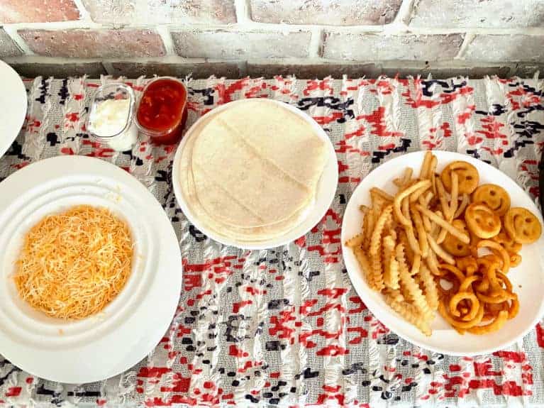 burrito bar toppings on table