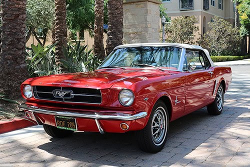 red_mustang_1965_Ford_Mustang We buy classic cars for top dollar
