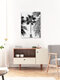 Mockup Photo art: Black and white shot of palm trees swaying in a gentle breeze