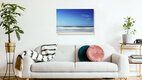 Mockup Fotokunst von Manuela Deigert: ruhige Strandlandschaft mit sanften Wellen