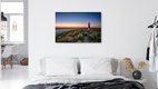 Mockup Photo art: Lighthouse on Sylt's coastline at sunrise, calm atmosphere.