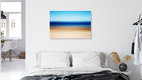 Mockup Fotokunst von Manuela Deigert: sanfte Farben und verschwommene Küstenlandschaft.
