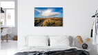 Mockup Photo art by Achim Thomae: View of Sylt's coastline, soft clouds above the sea.
