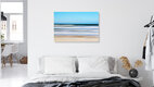 Mockup Fotokunst von Manuela Deigert: ruhiger Strand mit sanften Wellen und stimmungsvollem Farbverlauf