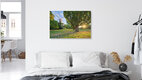 Mockup Photo art by Michael Valjak: Windmill in Bremen at sunrise, surrounded by grass and trees.