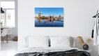 Mockup Photo art by Achim Thomae: Windmills in Kinderdijk with calm water reflection.