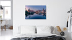 Mockup Photo art by Achim Thomae: city view of Lübeck at sunset featuring the Holstentor