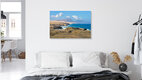 Mockup Photo art captures the coast near La Pared on Fuerteventura with gentle waves and clear skies.