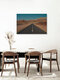 Mockup Expansive desert road under clear sky, conveying solitude and freedom.