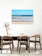 Mockup Fotokunst von Manuela Deigert: ruhiger Strand mit sanften Wellen und stimmungsvollem Farbverlauf