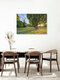 Mockup Photo art by Michael Valjak: Windmill in Bremen at sunrise, surrounded by grass and trees.
