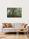 Mockup Misty forest in July, capturing a tranquil atmosphere with soft fog among the trees.