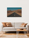 Mockup Expansive desert road under clear sky, conveying solitude and freedom.