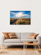 Mockup Photo art by Achim Thomae: View of Sylt's coastline, soft clouds above the sea.