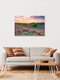 Mockup Fotokunst von Michael Valjak: Abendstimmung im Nationalpark Veluwezoom, sanfte Hügel und blühende Heide.