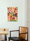 Mockup Wall art featuring a vibrant garden landscape filled with flowers and plants.