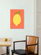 Mockup Wall art featuring a cheerful lemon in pink and yellow, spreading summer vibes.