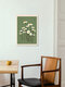 Mockup Wall art featuring delicate daisies on a green background in soft colors.
