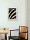 Mockup Wall art of a funny zebra illustrated in vibrant colors.