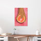 Mockup Illustration by Raissa Oltmanns: a hand holding a pink grapefruit