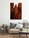 Mockup Photo art by Tal Paz-Fridman: tall sandstone pillars in the Negev under sunlight