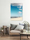 Mockup Fotokunst von Manuela Deigert: ruhiger Mann am Strand unter Wolken mit Nordseeblick