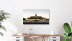 Mockup Photo art: calm capture of the Royal Palace in Cambodia with monk in the foreground.