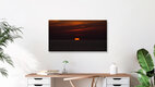Mockup Photo art by Andreas Weiser: sunset over wind turbines, calming atmosphere.