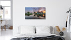 Mockup Sunrise over windmills in Holland with calm reflection in the water
