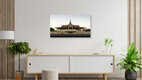 Mockup Photo art: calm capture of the Royal Palace in Cambodia with monk in the foreground.