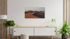 Mockup Photo art by Dennis Wehrmann: peaceful sunrise in the Sahara with gentle dunes.