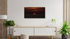 Mockup Photo art by Andreas Weiser: sunset over wind turbines, calming atmosphere.