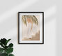 Mockup Illustration of a relaxed woman in warm summer colors, surrounded by palm leaves.
