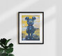 Mockup Wall art featuring a playful illustration of a Kaws-like character in yellow