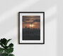 Mockup Fotokunst von Patrick Noack: sanfter Sonnenaufgang über der Stadtlandschaft