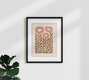 Mockup Wall art in soft pink tones featuring floral patterns in a harmonious arrangement.
