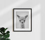 Mockup Black and white photo of a cute baby alpaca with a joyful expression