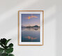 Mockup Photo art: Sunrise over Lake Bled with gentle clouds and morning mist.
