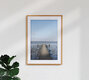 Mockup Wadden Sea at low tide with a calm wooden pier near the beach.