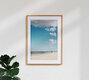 Mockup Fotokunst von Manuela Deigert: ruhiger Mann am Strand unter Wolken mit Nordseeblick