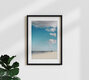 Mockup Fotokunst von Manuela Deigert: ruhiger Mann am Strand unter Wolken mit Nordseeblick