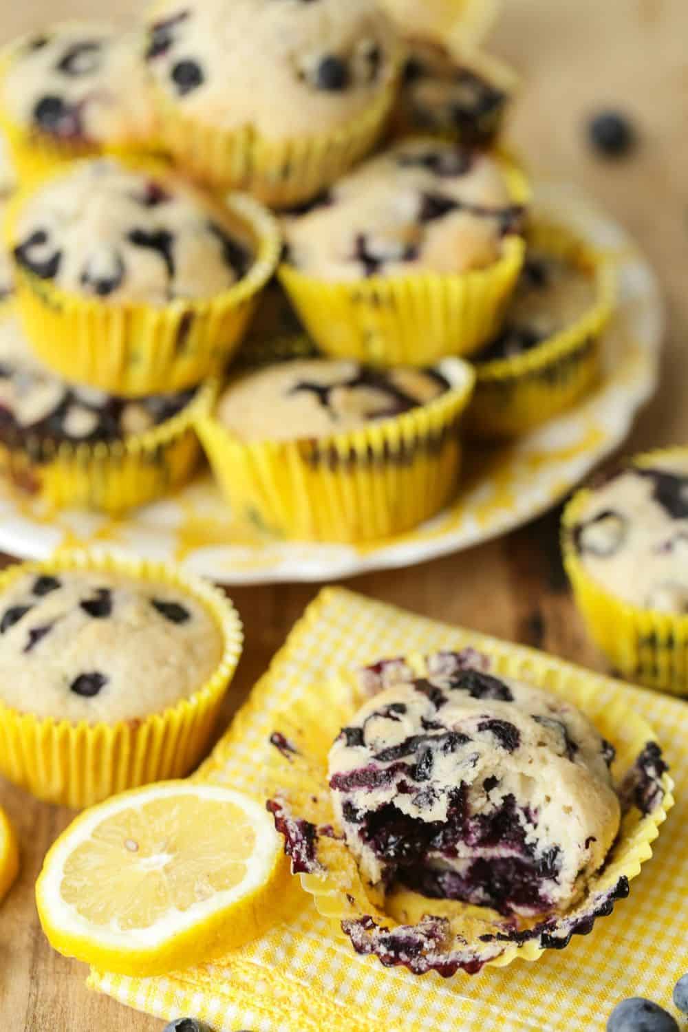 Sweet farm-fresh blueberries and tart lemons pair up for these delicious Lemon Blueberry Muffins. This easy recipe is perfect for breakfast or dessert. This muffin recipe is a delicious twist to the classic blueberry muffins. #lemonblueberrymuffins #blueberryrecipes #blueberrymuffins
