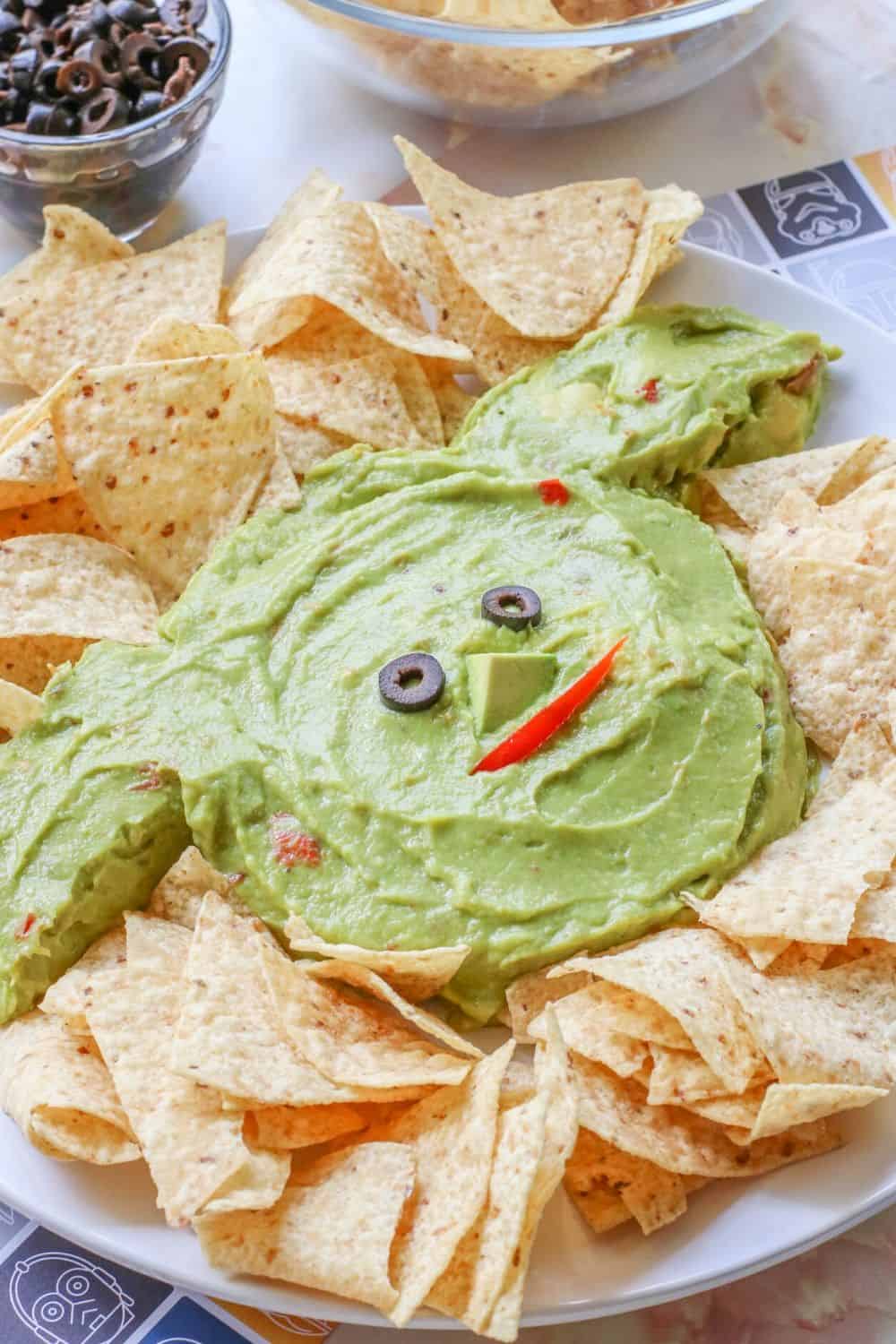 Whether it's Cinco de Mayo or Star Wars day, this Baby Yoda Guacamole Platter is the fun entertaining recipe that Star Wars fans will think is out of this world. Everyone loves an easy guacamole recipe and this one is perfect for the Baby Yoda fans in your life.