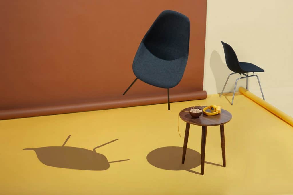 Modern image of chairs and table in retro neutral room