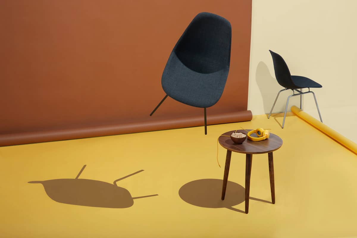 Modern image of chairs and table in retro neutral room