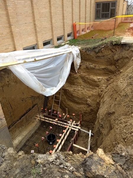 digging a hole for church's elevator
